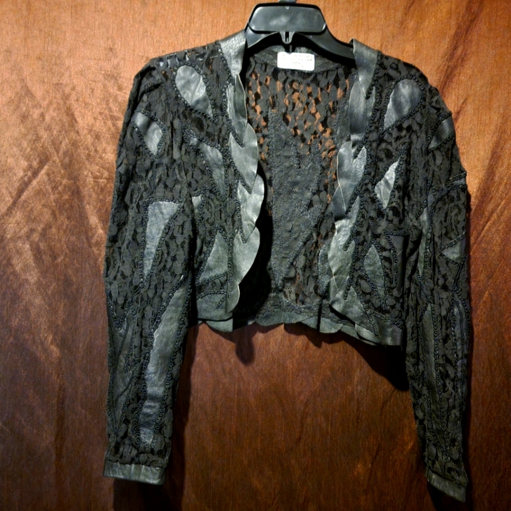 Lase and leather vest